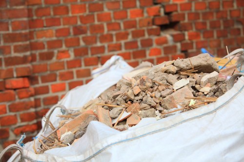 Recycling bins and separated materials during a Hillingdon flat-clearance job